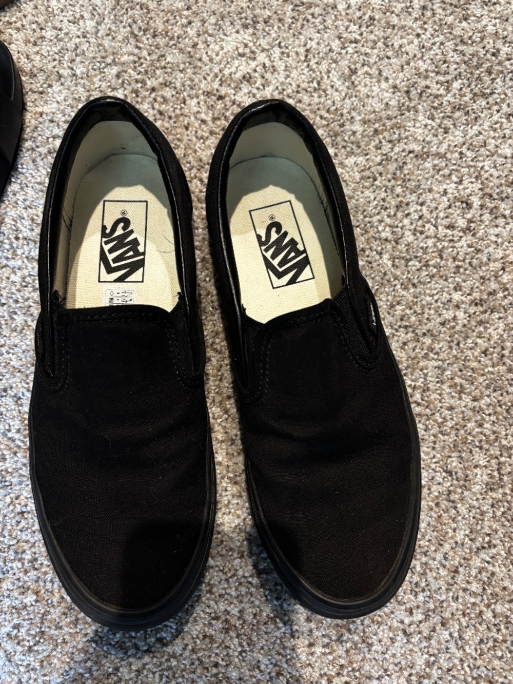 Black Vans.
